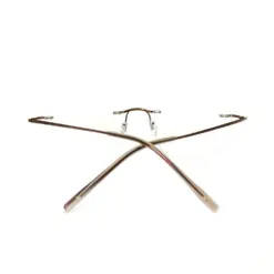 Copper Brown Rimless Eyeglasses at chashma